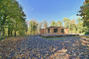 Modern chalet voor 6 personen met hottub aan de rand van het bos in Noiseux