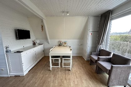 009 Duinhuisje H55