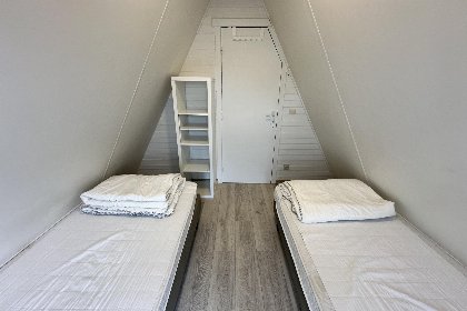 014 Duinhuisje H55
