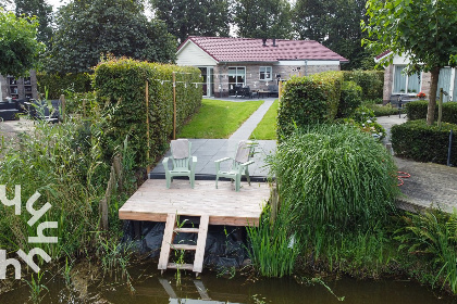 006 Modern 4 persoons vakantiehuis met riante tuin en terras aan de zwemvijver in Havelte