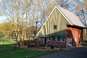 Mooi 12 persoons vakantiehuis midden in het bos in Drenthe met hottub