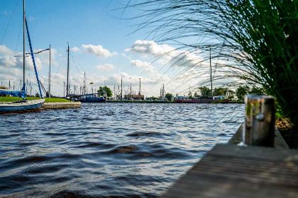 031 Luxe 8 persoons vakantiehuis aan het water op een fijn vakantiepark