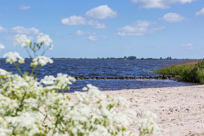 020 4 persoons Docklodge aan het water met eigen insteekhaven in Delfstrahuizen