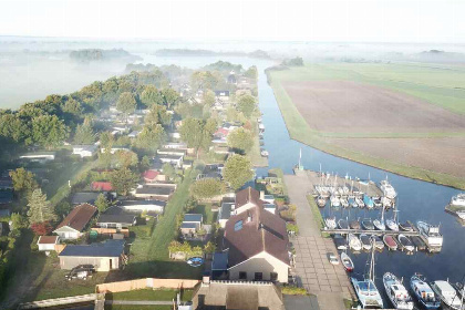 035 Heerlijk wellness villa met sauna voor 8 personen aan de Friese Meren