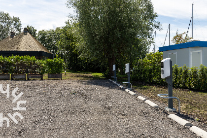 005 4 persoons chalet in Lemmer met buiten open haard en vrij uitzicht over het water