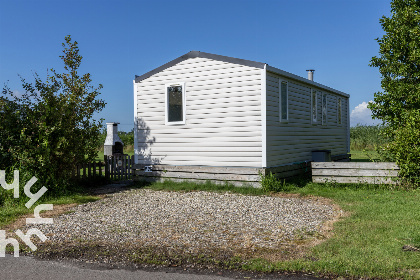 015 4 persoons chalet in Lemmer met buiten open haard en vrij uitzicht over het water