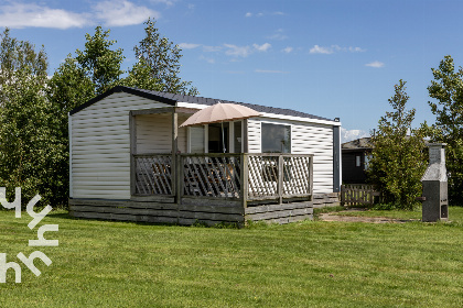 019 4 persoons chalet in Lemmer met buiten open haard en vrij uitzicht over het water