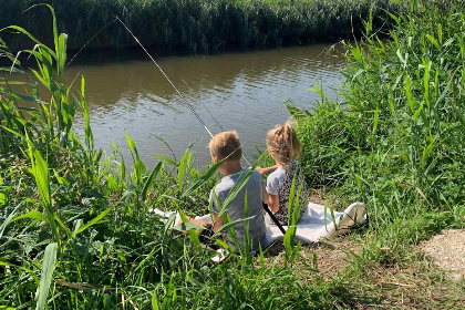 028 Prachtig gelegen groepsaccommodatie voor 22 personen met vrij uitzicht, aan viswater