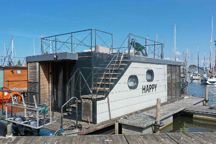 006 Knusse 4 persoons House boat met uitzicht over het water in de Jachthaven van Warns