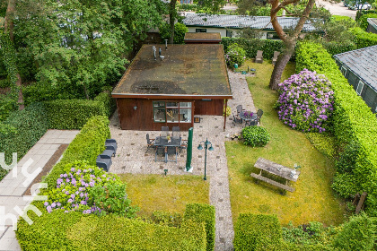 004 5 persoons bungalow met omheinde tuin en privacy op de Veluwe met een zwembad op het park