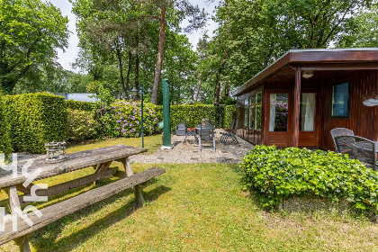 018 5 persoons bungalow met omheinde tuin en privacy op de Veluwe met een zwembad op het park