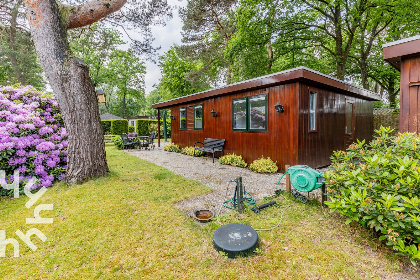 046 5 persoons bungalow met omheinde tuin en privacy op de Veluwe met een zwembad op het park