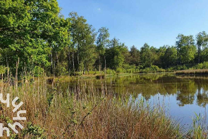 001 Gezellig 2 persoons vakantiehuisje in een rustige, bosrijke wijk in Ermelo op de Veluwe