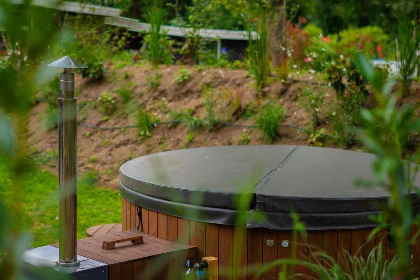 005 10 persoons vakantiehuis met een sauna, hottub en een bioscoop op vakantiepark de Rimboe