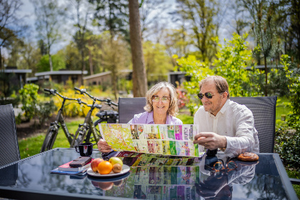 033 10 persoons vakantiehuis met een sauna, hottub en een bioscoop op vakantiepark de Rimboe