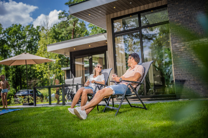 031 Modern 4 persoons vakantiehuis met airco, sfeerhaard en een dakterras op de Veluwe