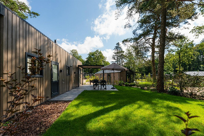 001 Modern 5 persoons vakantiehuis op een vakantiepark met zwembad op de Veluwe