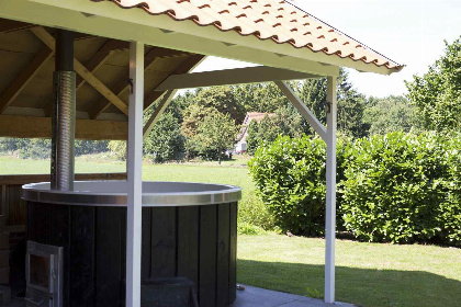 027 Luxe 6 persoons vakantiehuis met hottub, Finse sauna en sunshower douche in de Achterhoek