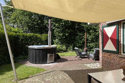 020 Modern wellnesshuis voor 4 personen met hottub, sunshower, regendouche en ligbad