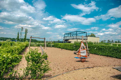 011 Heerlijk 6 persoons accommodatie met schuifpui op vakantiepark met wellnessmogelijkheden