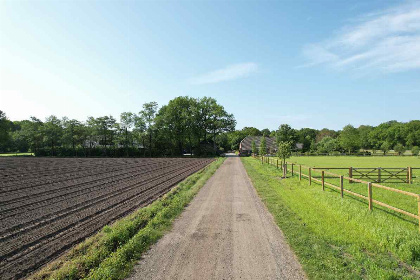 034 Luxe geschakelde 5 persoons vakantiewoning met vide en hottub op de Veluwe