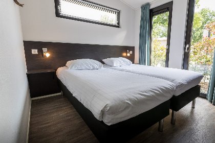 004 Bos Lodge 55 6 personen met Hottub