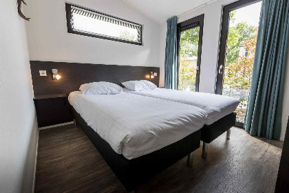 012 Comfortabele 6 persoonsvakantiewoning met gratis WiFi op de Veluwe