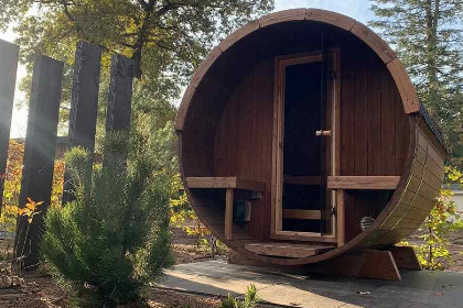 006 Mooie 4 persoons vakantiewoning met sauna en hottub dichtbij de natuur op de Veluwe