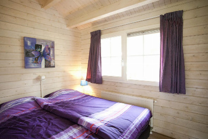 004 4 persoons blokhut met sauna met natuurmeer en zandstrand nabij Venlo