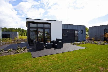 002 4 persoons vakantiehuis op vakantiepark Maasduinen met natuurmeer en zandstrand