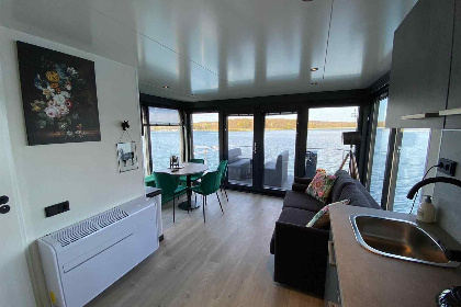 023 Mooi 4 6 persoons Houseboat met dakterras aan de Mookerplas met uitzicht op water