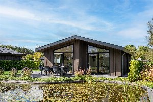 Molenhuys Waterzicht Premium met Ligbad | 4 personen Molenhuys Waterzicht Premium met Ligbad | 4 personen