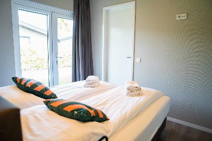 008 Wood Lodge Waterzicht met Hottub | 4 personen