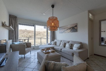 002 Wijde Blick 212 | Callantsoog | Ruim balkon met uitzicht op de duinen 002 Wijde Blick 212 | Callantsoog | Ruim balkon met uitzicht op de duinen