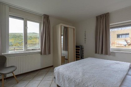 007 Wijde Blick 212 | Callantsoog | Ruim balkon met uitzicht op de duinen 007 Wijde Blick 212 | Callantsoog | Ruim balkon met uitzicht op de duinen