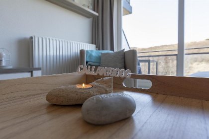 016 Wijde Blick 212 | Callantsoog | Ruim balkon met uitzicht op de duinen 016 Wijde Blick 212 | Callantsoog | Ruim balkon met uitzicht op de duinen