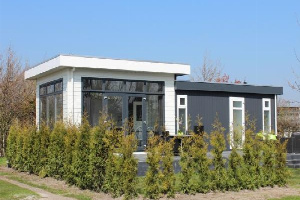 Chalet voor 6 personen met sauna op een familiepark aan de Noordzee kust