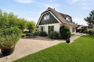 Villa Noorderzon | Julianadorp aan Zee | Omheinde tuin