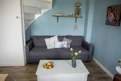 006 Knus 2 persoons appartement met uitzicht op het water en maritiem interieur in Blokzijl