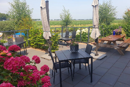 008 Knus 2 persoons appartement met uitzicht op het water en maritiem interieur in Blokzijl