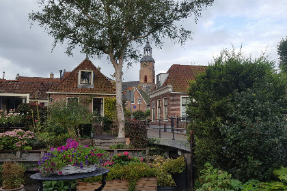 012 Knus 2 persoons appartement met uitzicht op het water en maritiem interieur in Blokzijl