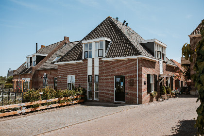 015 Knus 2 persoons appartement met uitzicht op het water en maritiem interieur in Blokzijl