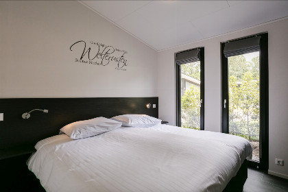 005 Bos Lodge met prive sauna en hottub   4 persoons