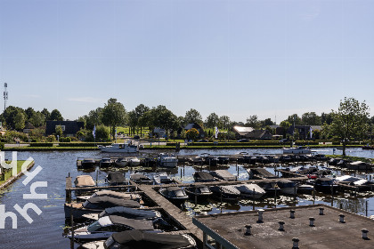 020 6 persoons appartement in Giethoorn met uitzicht over het water