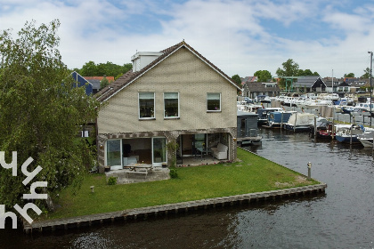 028 Gezellig vakantiehuis voor 4 personen aan het water in Giethoorn, Overijssel