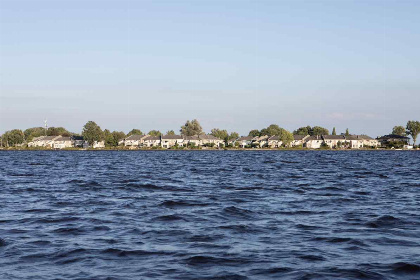 038 Modern 4 persoons bovenappartement nabij Giethoorn met prachtig uitzicht over het water