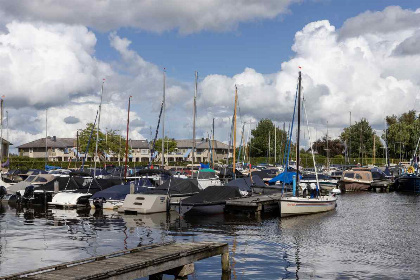 039 Modern 4 persoons bovenappartement nabij Giethoorn met prachtig uitzicht over het water