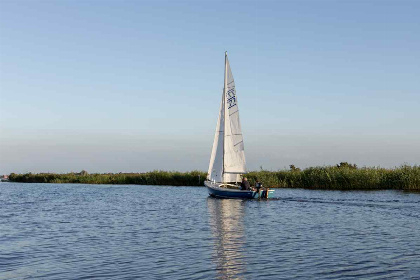 045 Modern 4 persoons bovenappartement nabij Giethoorn met prachtig uitzicht over het water