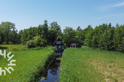 017 Prachtig Rietsnijdershuisje met trampoline en terras aan de Bovenwijde in Giethoorn