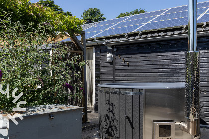 030 Sfeervol 4 persoons appartement met een hottub in de tuin in Nieuw Heeten